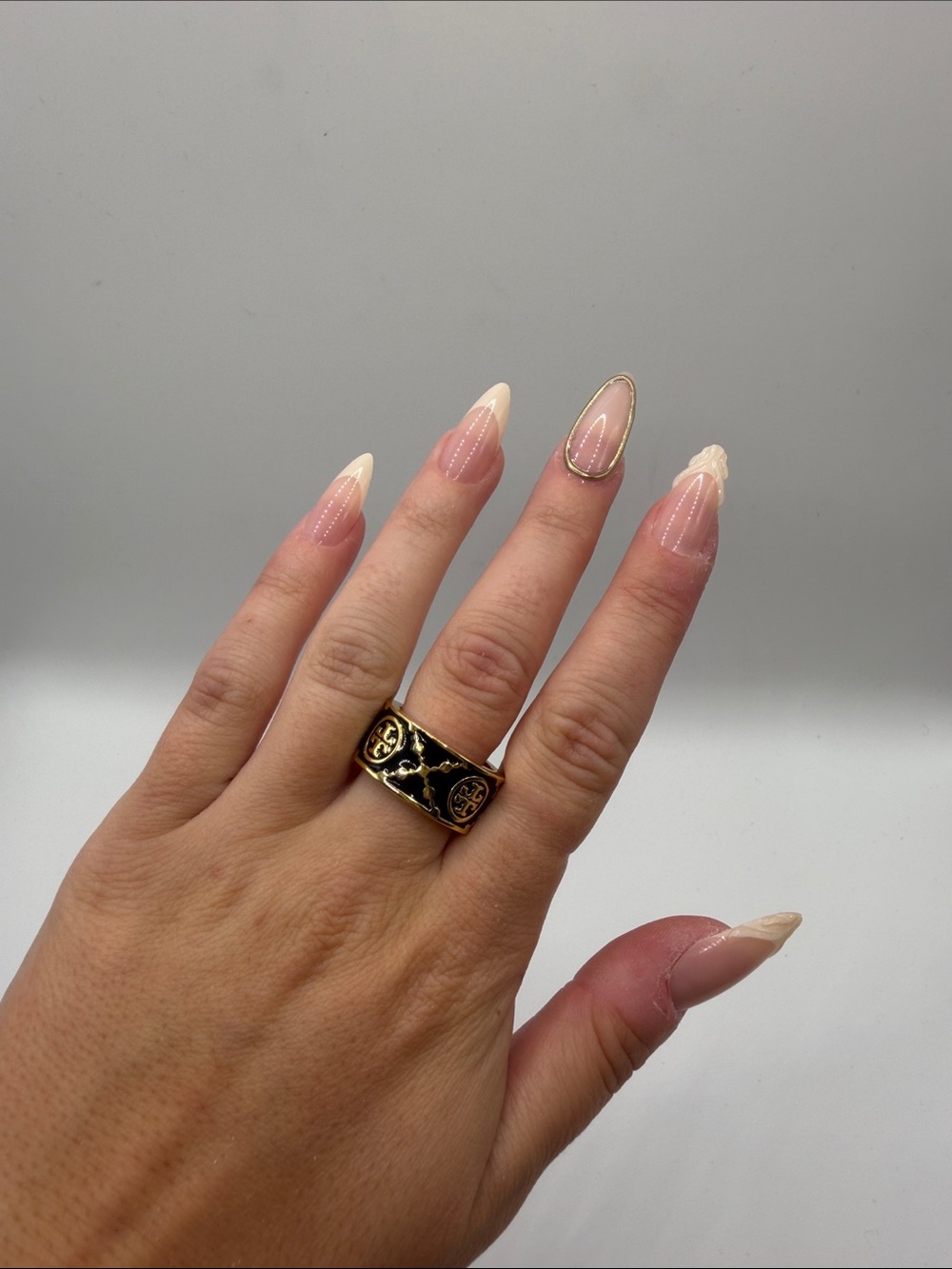 109. Tory Burch Gold and Black Enamel Statement Ring Tory Burch Size 6 1/2